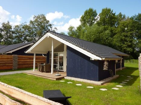 die Terrasse des Hauses ist Überdacht