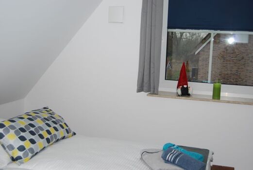 Verdunklungsvorhänge und Thermorollos