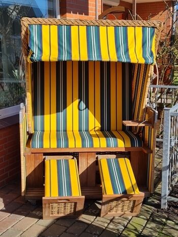 Auf der Terrasse erwartet Sie ein gemütlicher Strandkorb für kuschelige Stunden zu Zweit