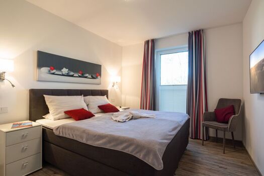 zweites Schlafzimmer mit TV