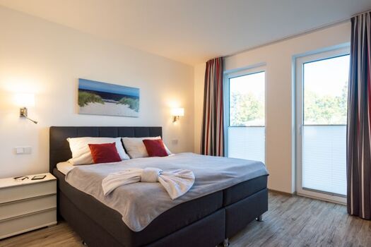 Schlafzimmer mit Badezimmer en Suite