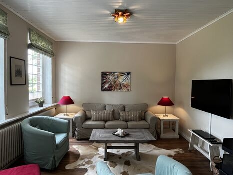 Wohnzimmer mit Kamin