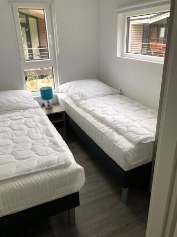 Zweites Schlafzimmer mit zwei Einzelbetten