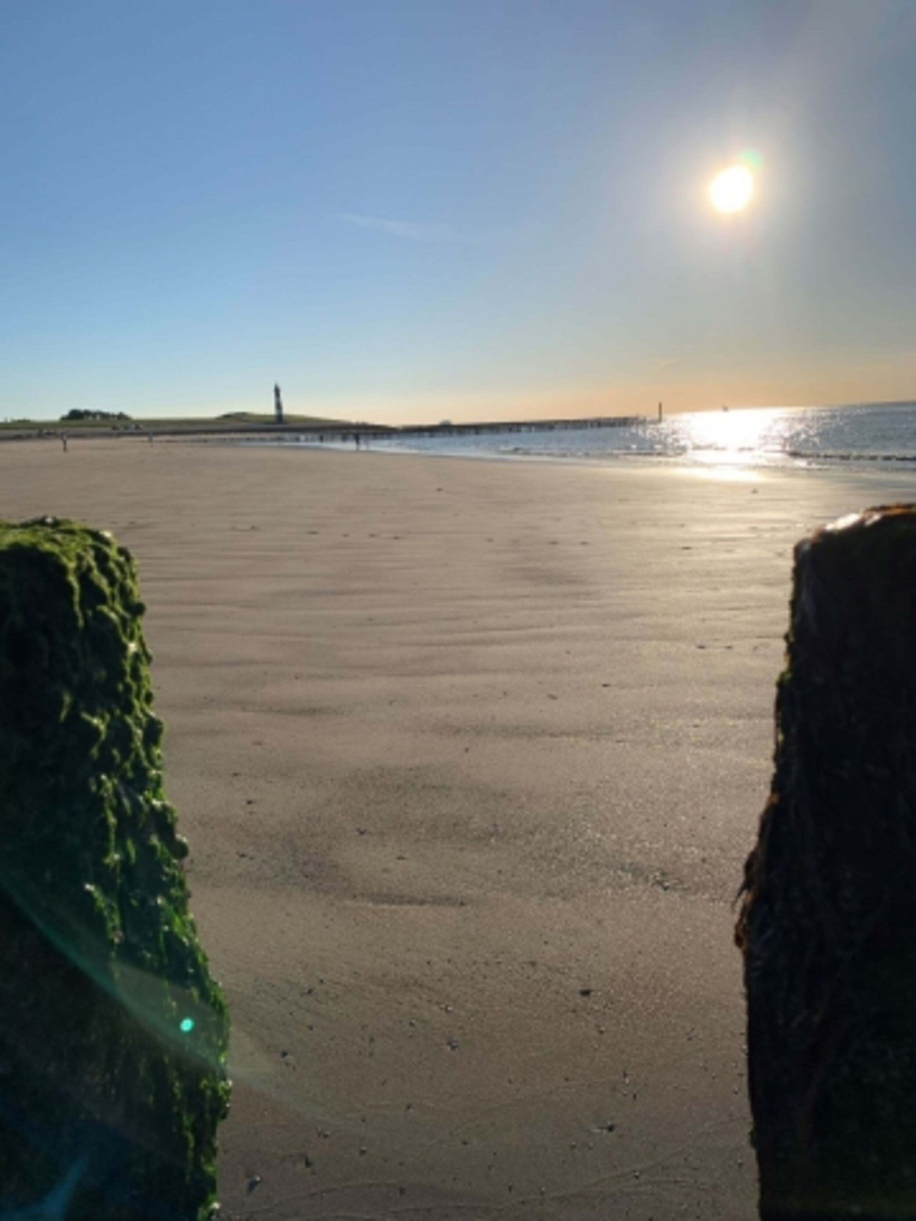 Strand und Leuchtturm