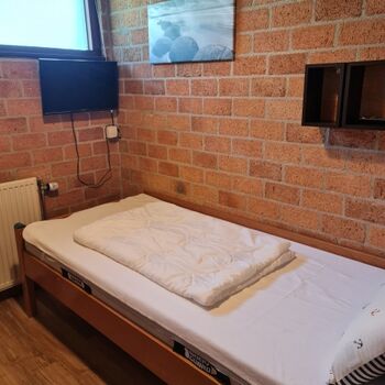 Einzelzimmer mit TV, elek. Lattenrost