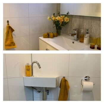 2 Badezimmer mit Dusche und eine  separate Gästetoilette