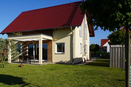 Haus mit Glasüberdachung