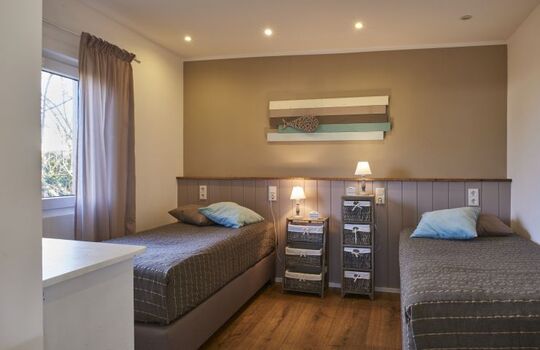 Kinderzimmer mit Boxpringbetten