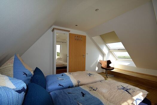 Schlafzimmer mit Doppelbett