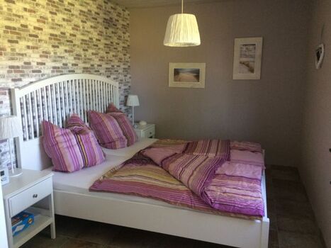 eines unserer gemütlichen Schlafzimmer