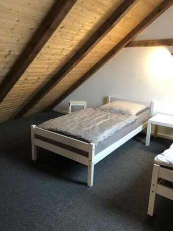 Einzelbetten auf der Schlafempore