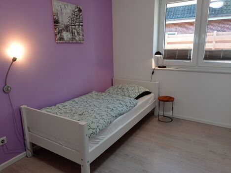 Schlafzimmer mit Einzelbett...