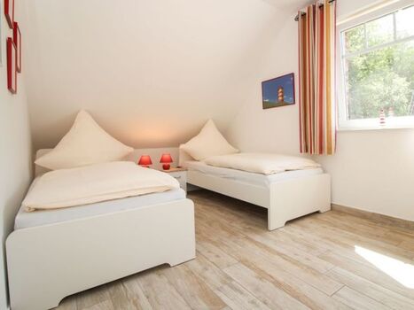 Das Schlafzimmer 3 ist mit zwei Einzelbetten (90x200cm) ausgestattet.