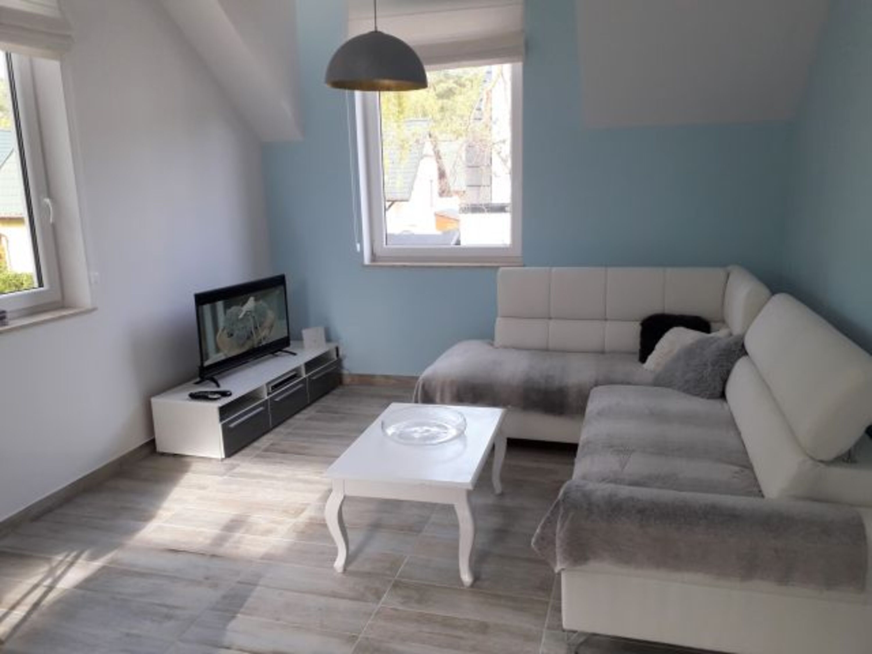 Wohnzimmer mit Ecksofa