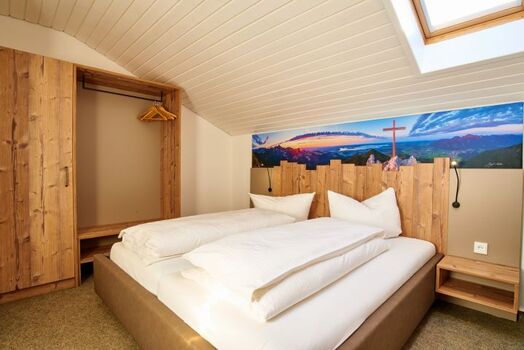 Schlafbereich mit Doppelbett