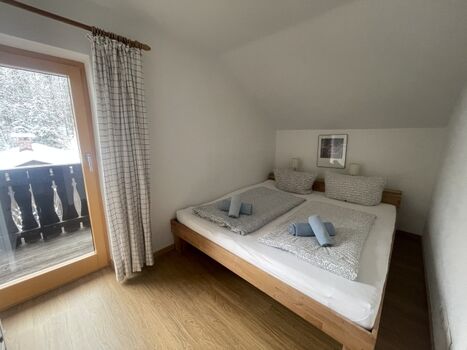 Schlafzimmer 3 im 1. Obergeschoß mit Balkon