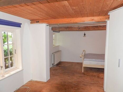 Schlafzimmer im Erdgeschoss mit Vorraum