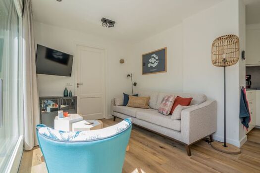 Die komfortable Sitzecke mit SMART TV