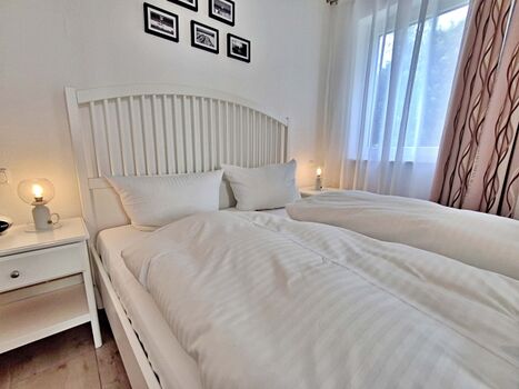 1. Schlafzimmer mit Doppelbett