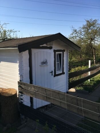 Holzhütte für mitgebrachte Fahrräder