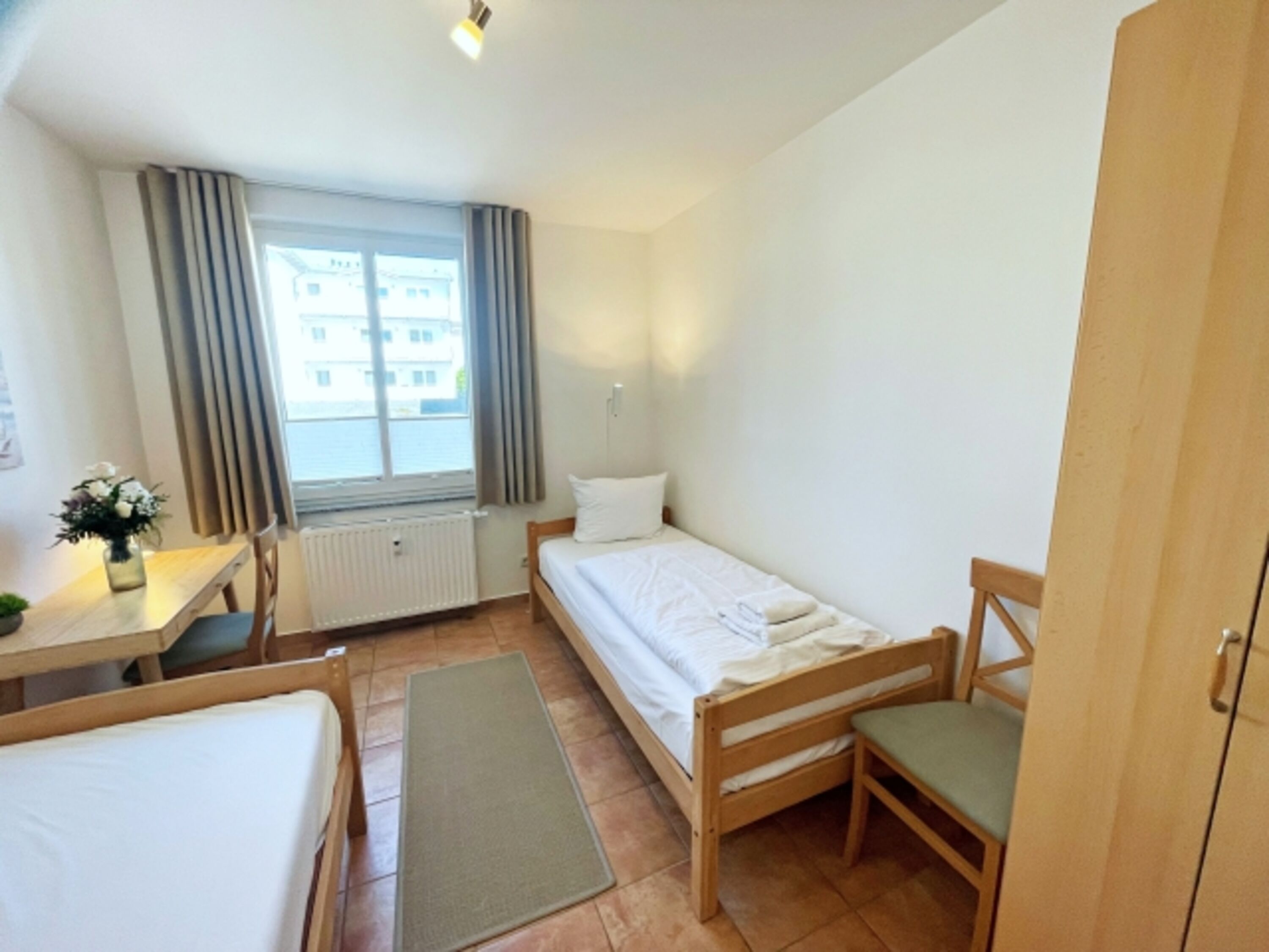 Schlafzimmer mit 2 Einzelbetten