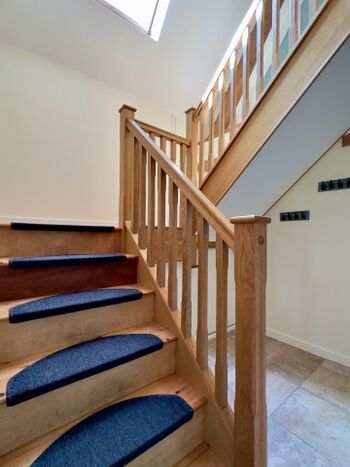 Treppenaufgang ins Obergeschoss