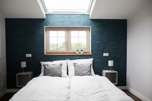 Schlafzimmer mit Doppelbett