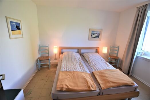 Schlafzimmer mit Doppelbett