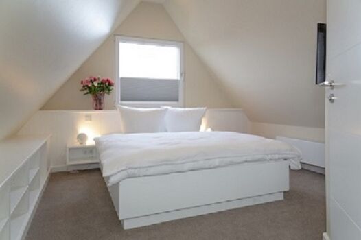 Boxspringbett im Dachgeschoss