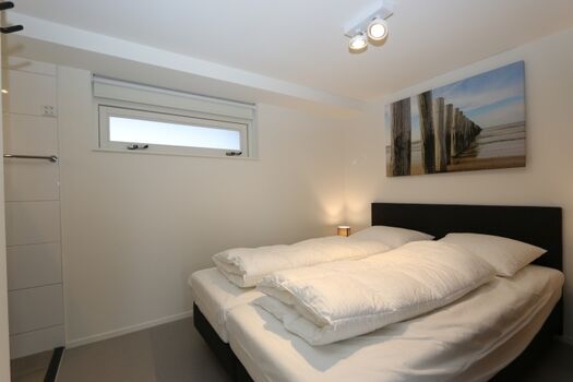 Schlafzimmer mit Doppelbett