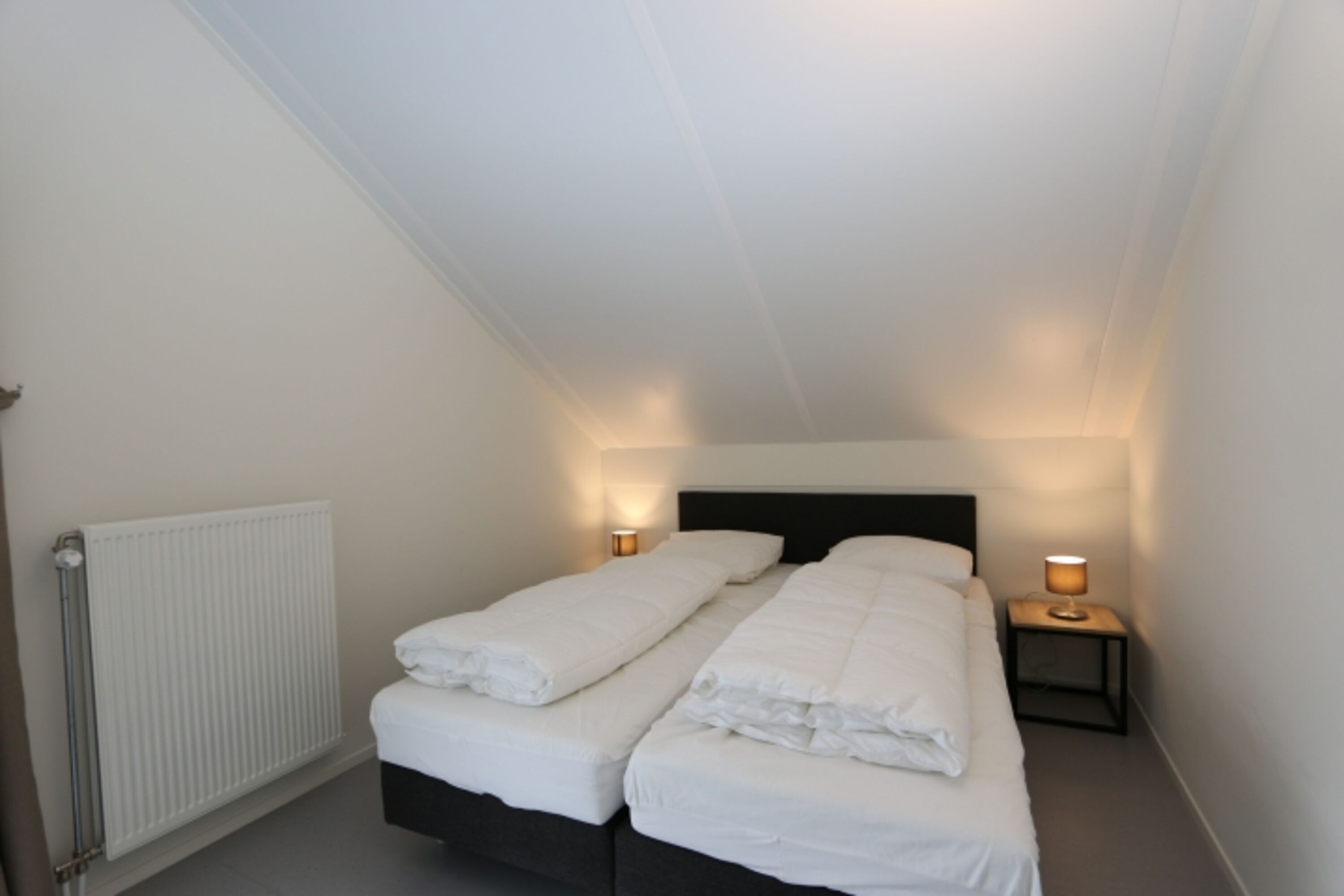 Schlafzimmer mit Doppelbett