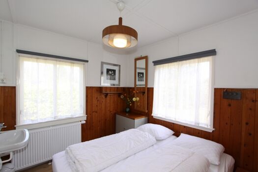 Schlafzimmer mit Doppelbett