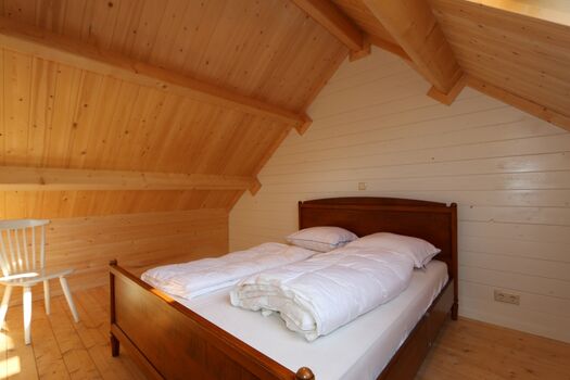 Schlafzimmer mit Doppelbett