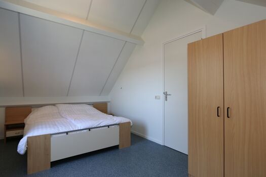 Schlafzimmer mit Doppelbett