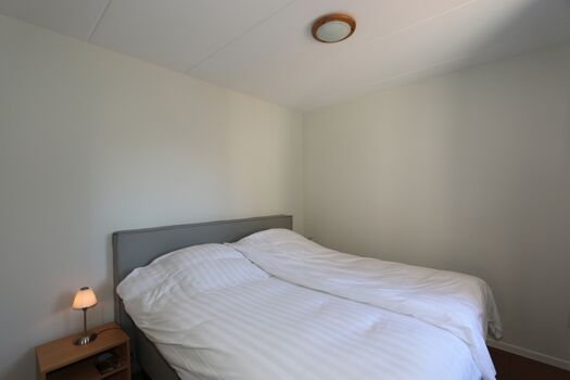 Schlafzimmer mit Doppelbett