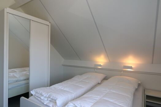 Schlafzimmer mit Doppelbett