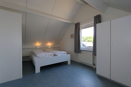 Schlafzimmer mit Doppelbett