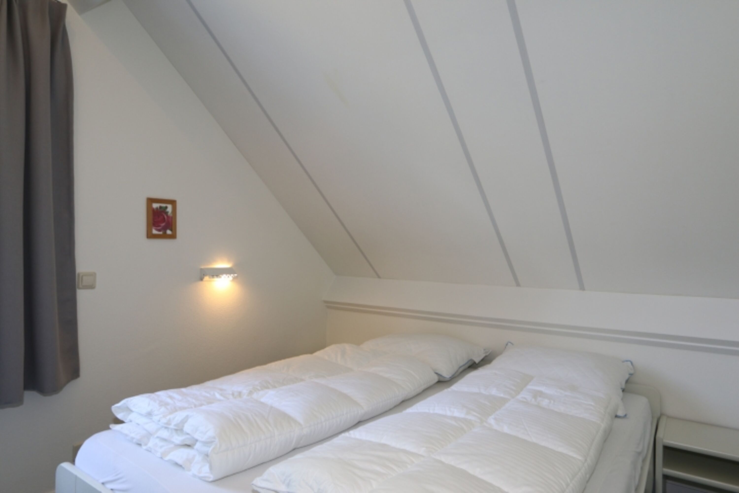 Schlafzimmer mit Doppelbett