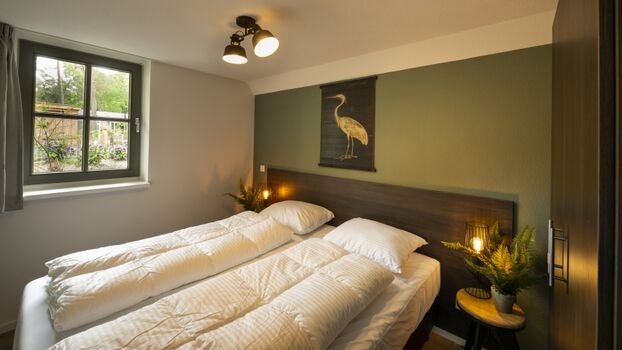 Schlafzimmer mit Doppelbett