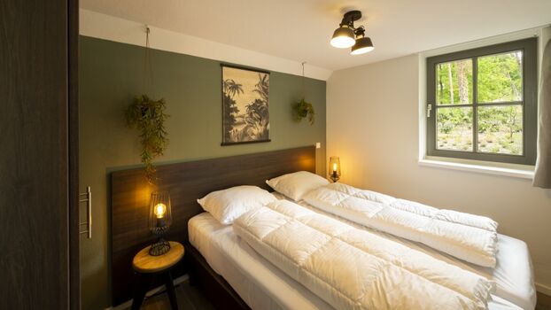 Schlafzimmer mit Doppelbett