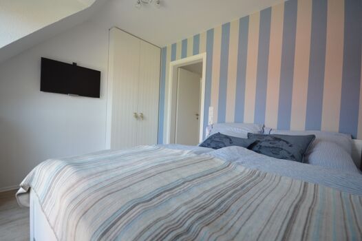 Schlafzimmer mit Doppelbett