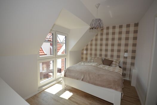 Schlafzimmer mit Doppelbett