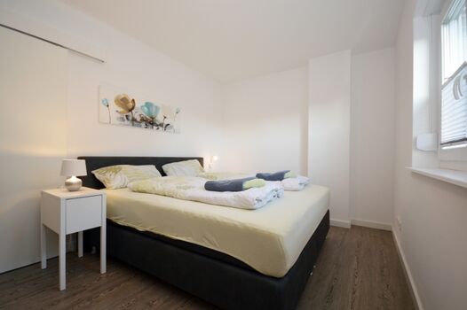 Schlafzimmer mit Doppelbett