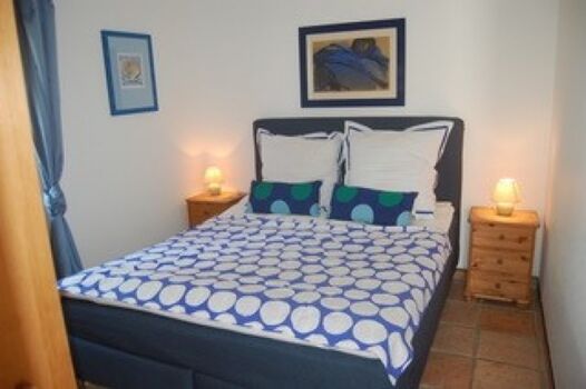 Schlafzimmer mit Doppelbett