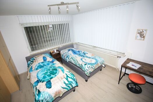 Schlafzimmer mit Einzelbetten