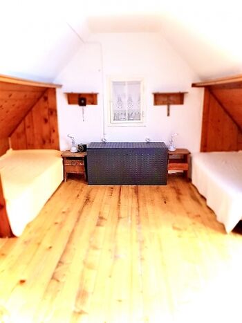 Schlafzimmer 1 mit zwei romantischen Kojen zum schlafen 