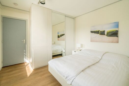 Hauptschlafzimmer mit Doppelbett