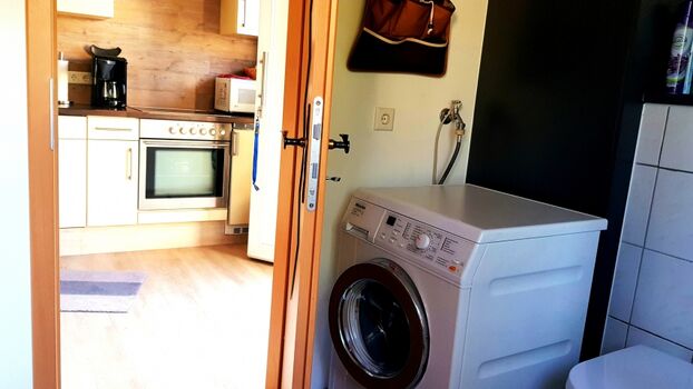 Im Bad die Miele-Waschmaschine 