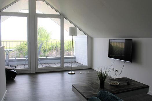 Galerie mit Loggia und Blick auf das Wattenmeer