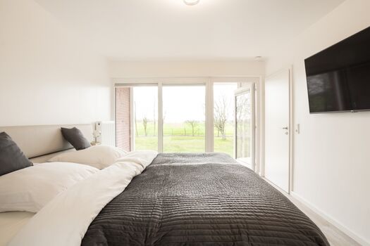 Schlafzimmer mit Blick zum Deich - 1. Stockwerk